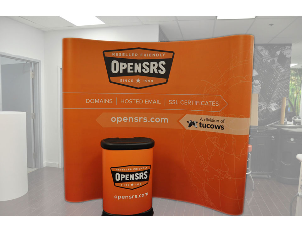 1---8'-Curved-Pop-Up-Display-with-Podium---Vinyl-Graphics | Best Displays